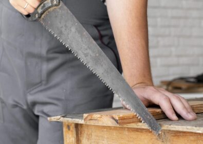person-working-wood-close-up